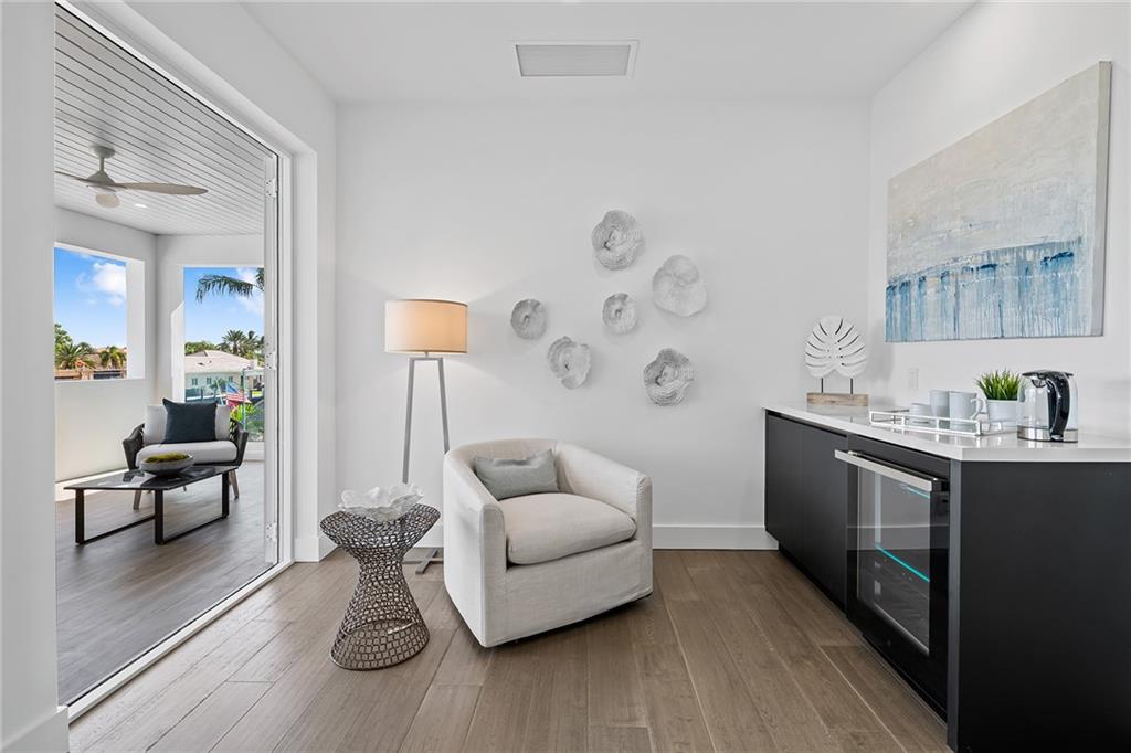 3204 Dover Road Pompano Beach, FL 33062 - Photo 46 of 73 a living room with furniture and wooden floor