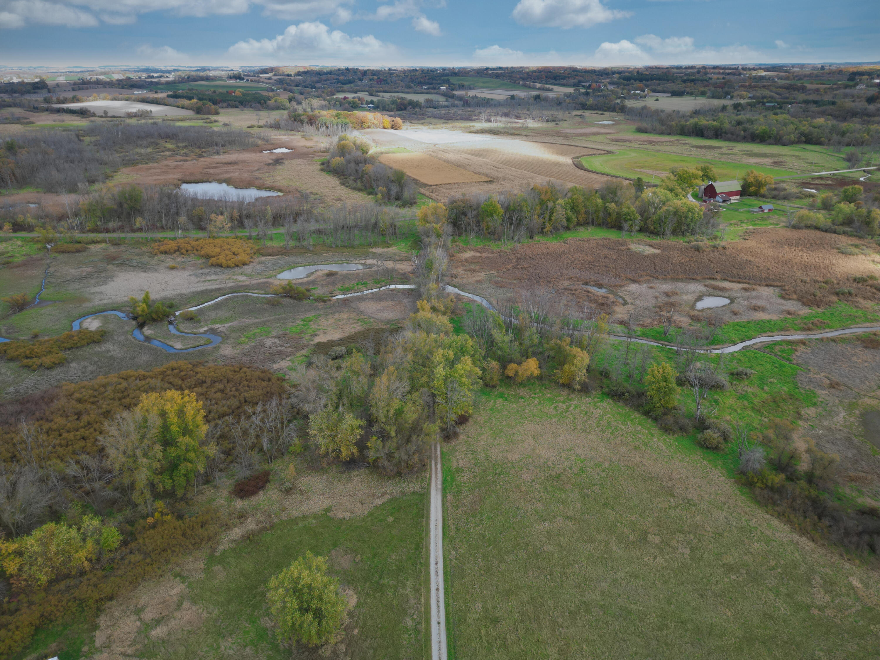 W2951 Monroe Road Ixonia, WI 53036 - Photo 30 of 36 Drone Monroe Rd. Driveway with land Nort