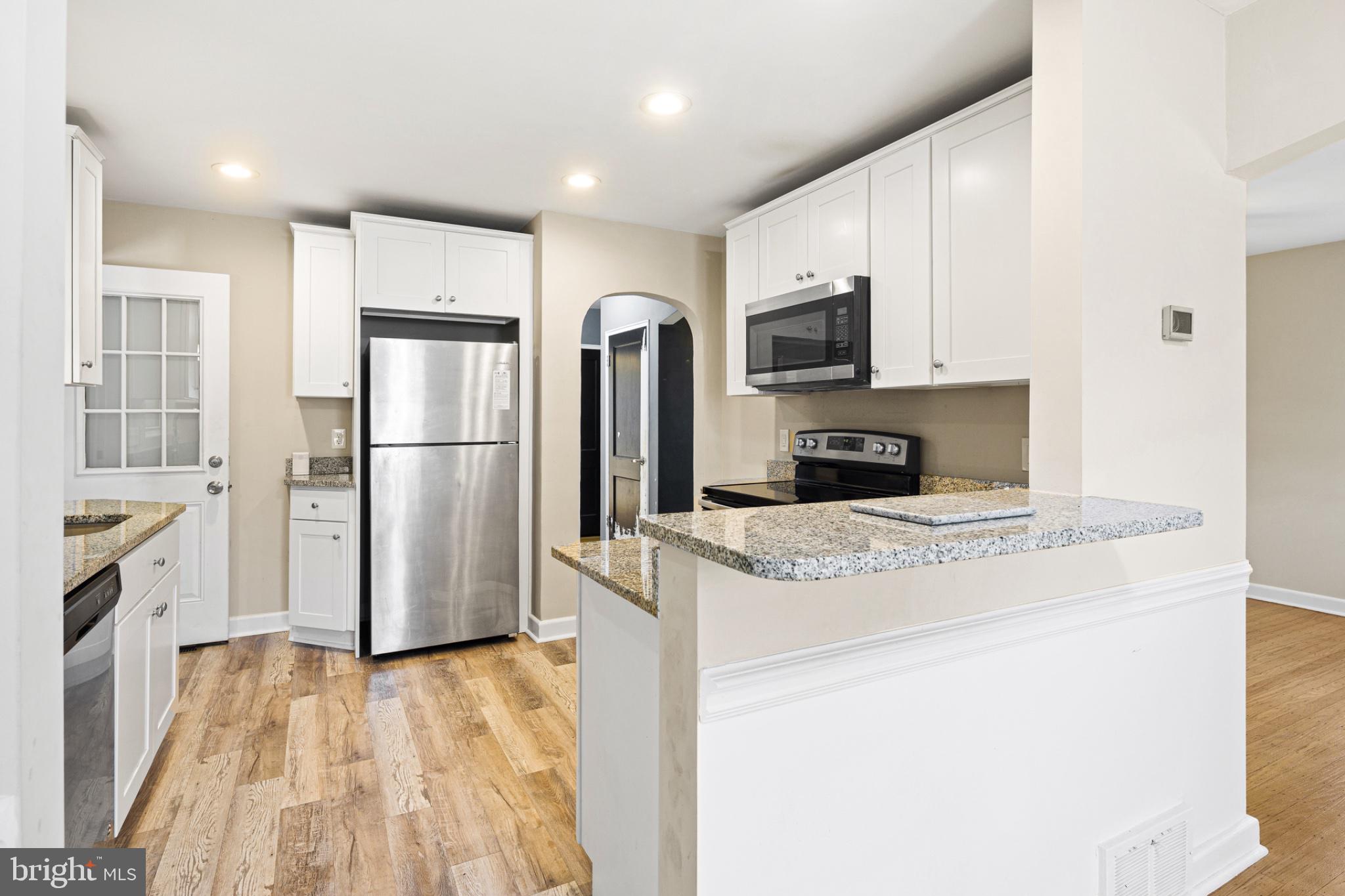 4 Virginia Avenue Palmyra, NJ 08065 - Photo 4 of 28 Modern kitchen with sleek finishes.