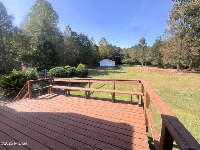 a view of swimming pool with seating