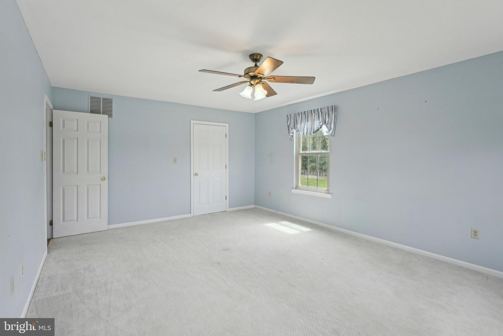 317 Clems Run Mullica Hill, NJ 08062 - Photo 18 of 33 a view of an empty room with a window