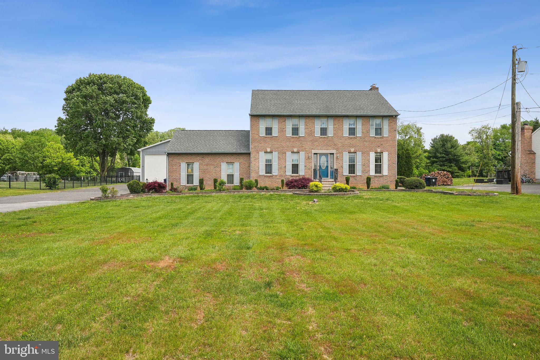 317 Clems Run Mullica Hill, NJ 08062 - Photo 2 of 33 a front view of house with yard and green space