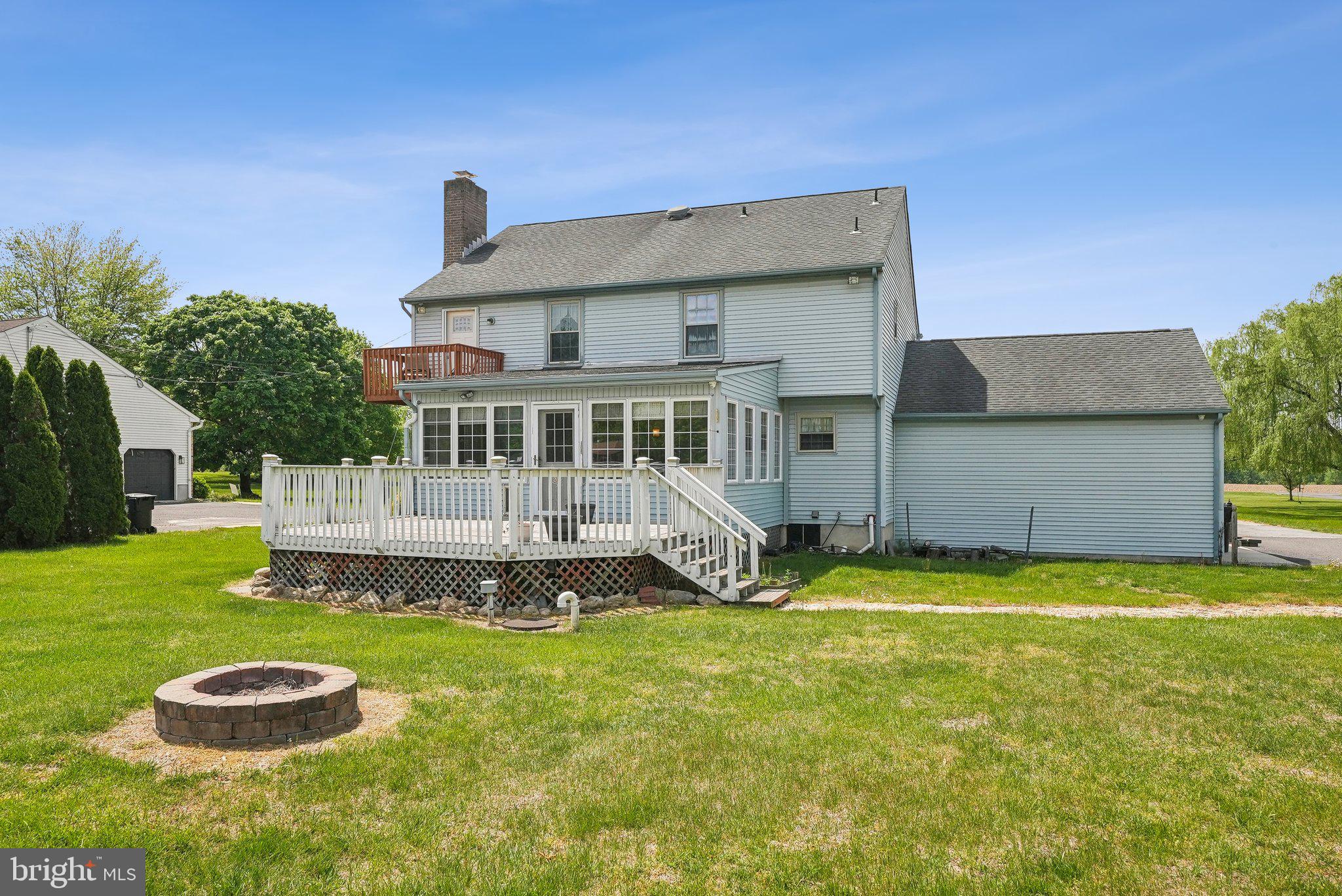 317 Clems Run Mullica Hill, NJ 08062 - Photo 29 of 33 a view of a house with a yard deck and a tree