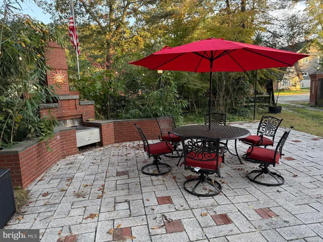 a view of a chairs and tables in the patio