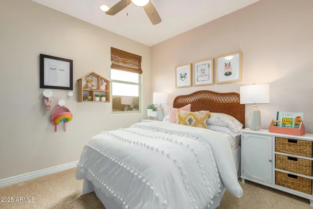 a bedroom with furniture and a window