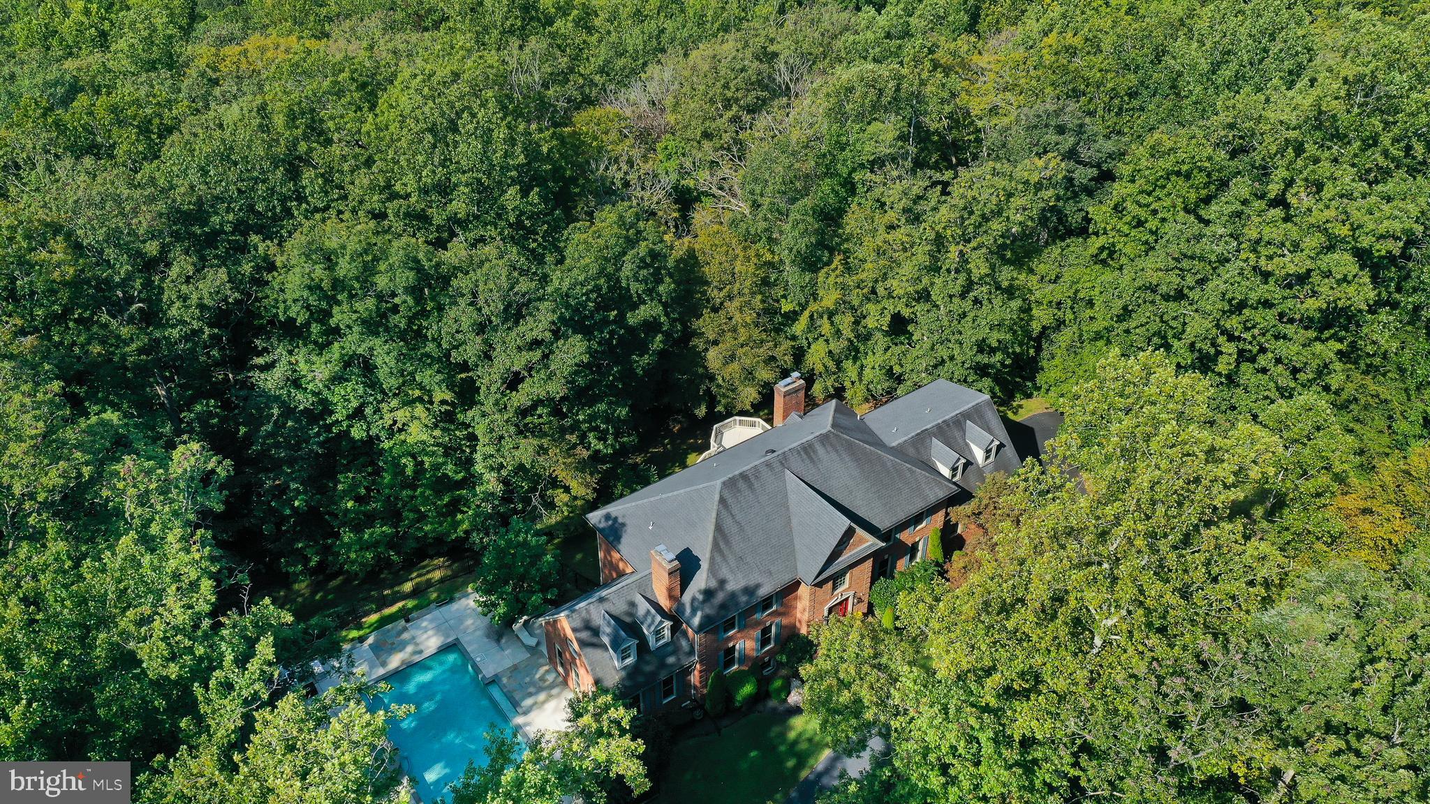 Gorgeous & Private Setting on 7.49-acres w/Pool!