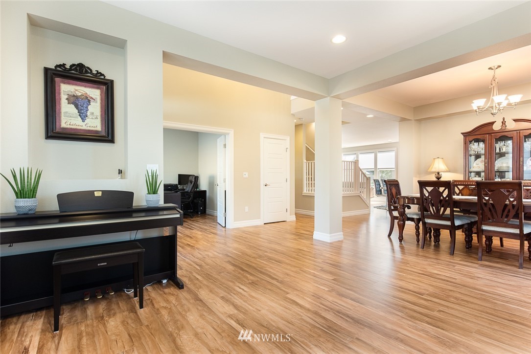 4407 Northeast 9th Street Renton, WA 98059 - Photo 3 of 13 a living room with furniture and wooden floor