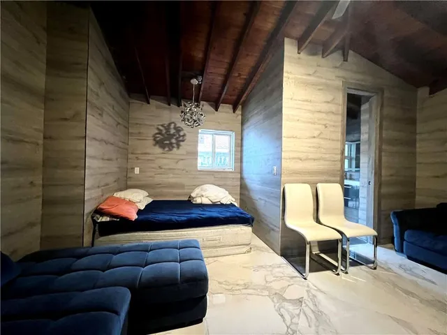 a room with furniture and a fireplace