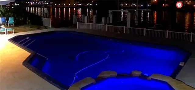 a view of backyard with trampoline