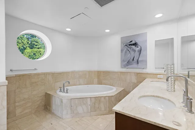 a bathroom with a sink and a bathtub
