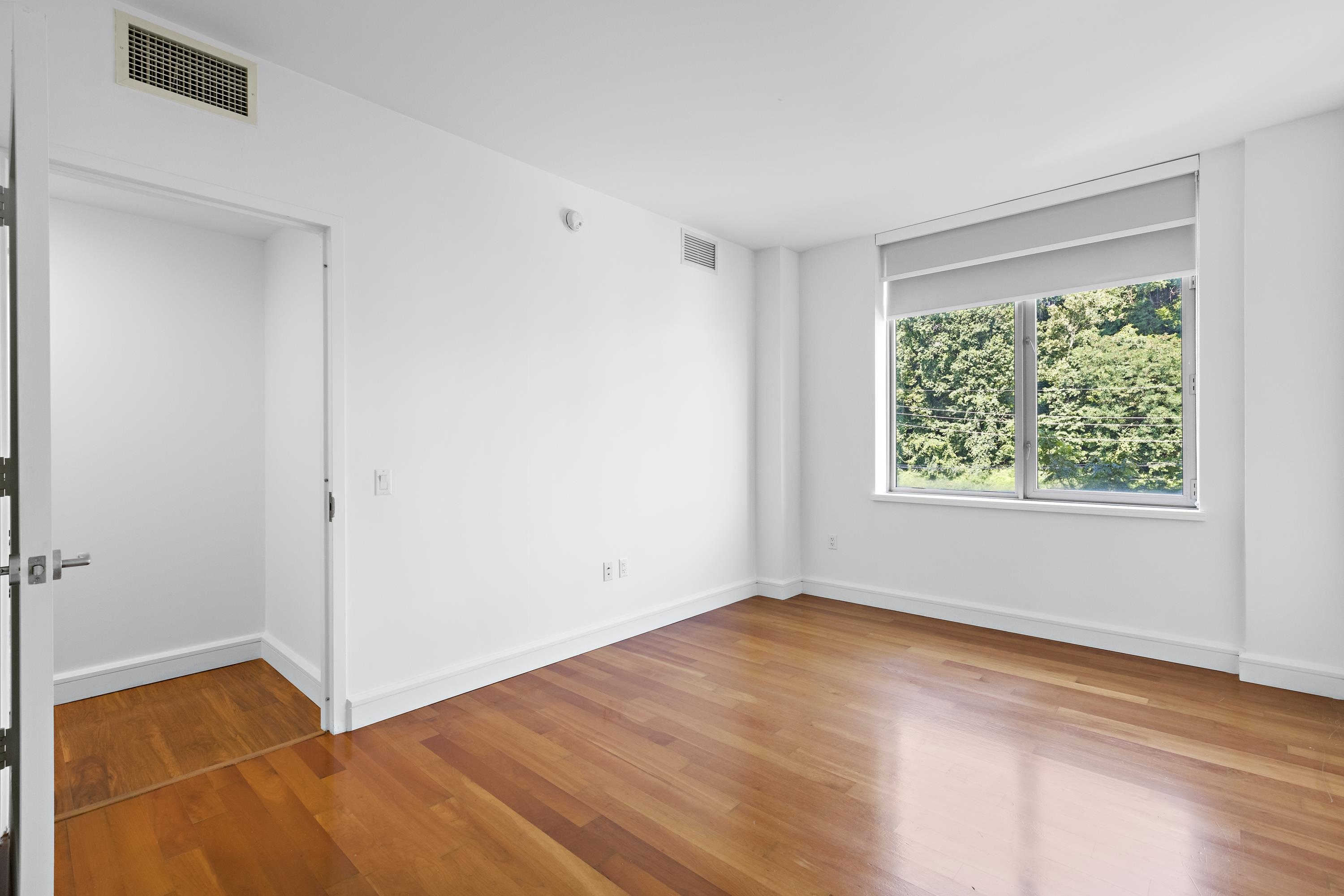 8100 River Road, Unit 510 North Bergen, NJ 07047 - Photo 21 of 25 a view of an empty room with a window