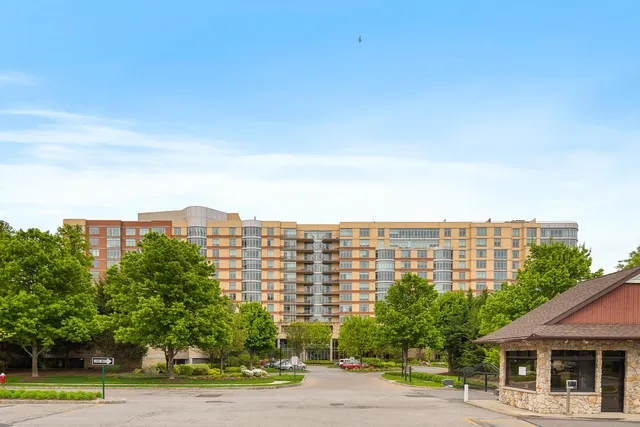 a view of a city with tall buildings in the background