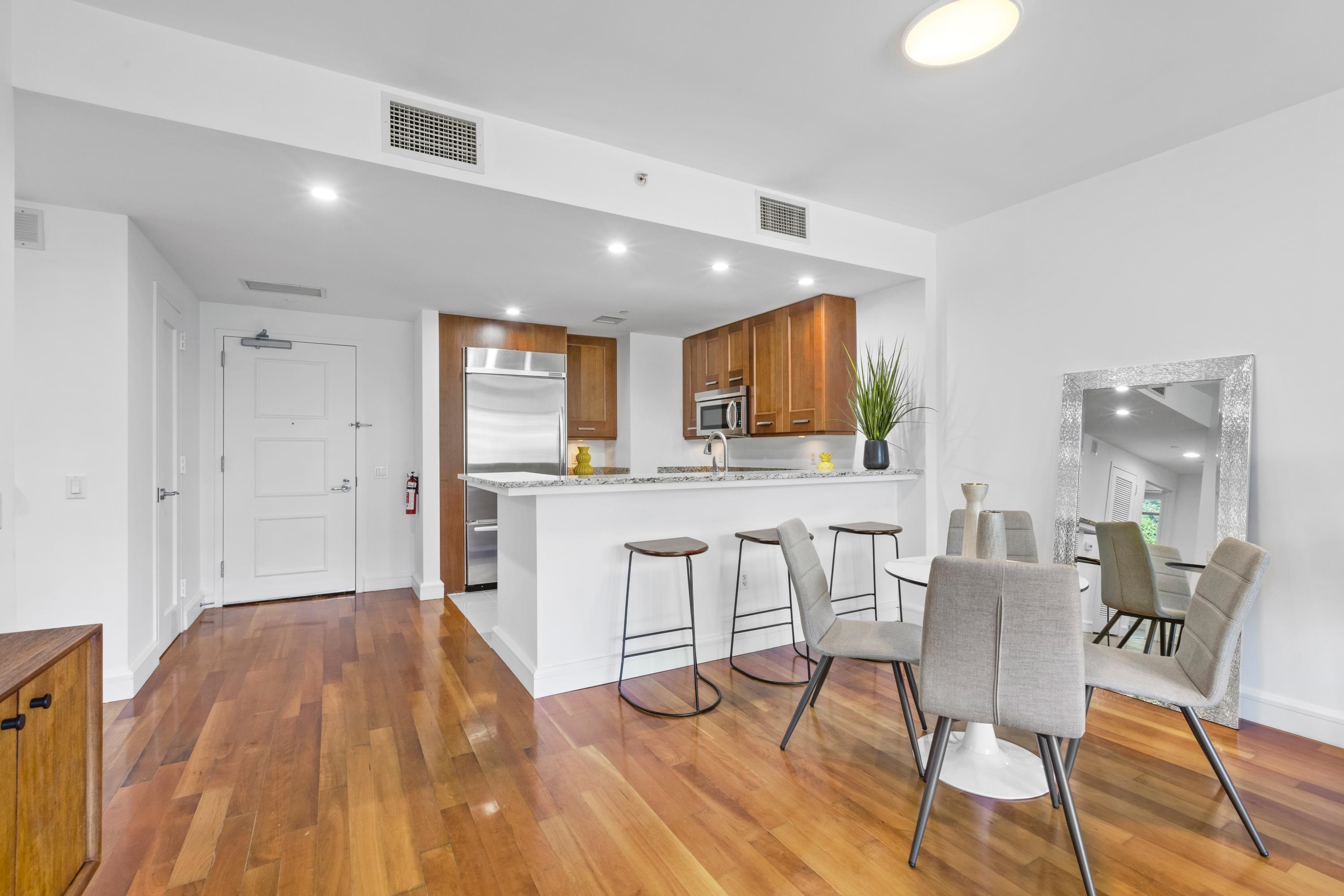 8100 River Road, Unit 510 North Bergen, NJ 07047 - Photo 7 of 25 a view of kitchen with cabinets and wooden floor