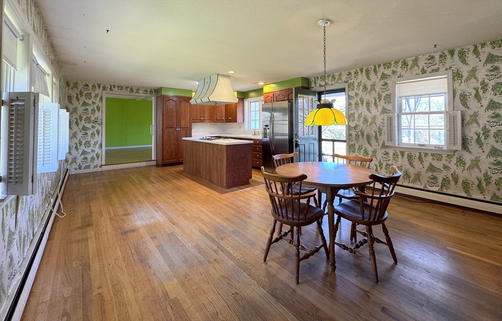 696 Bernardston Road Greenfield, MA 01301 - Photo 11 of 42 a view of a dining room with furniture and window