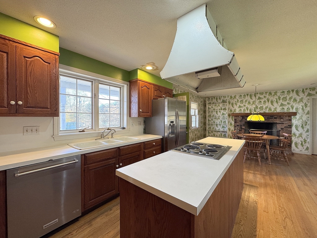 696 Bernardston Road Greenfield, MA 01301 - Photo 12 of 42 a kitchen that has a sink and a stove