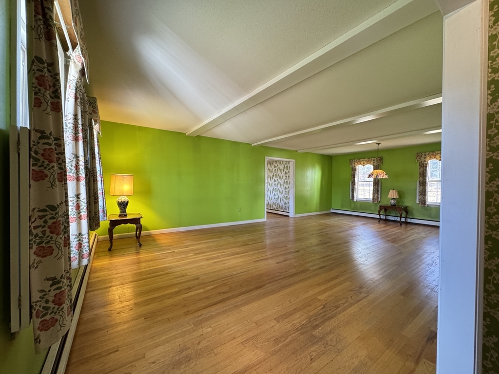 696 Bernardston Road Greenfield, MA 01301 - Photo 16 of 42 a view of a room with window and wooden floor