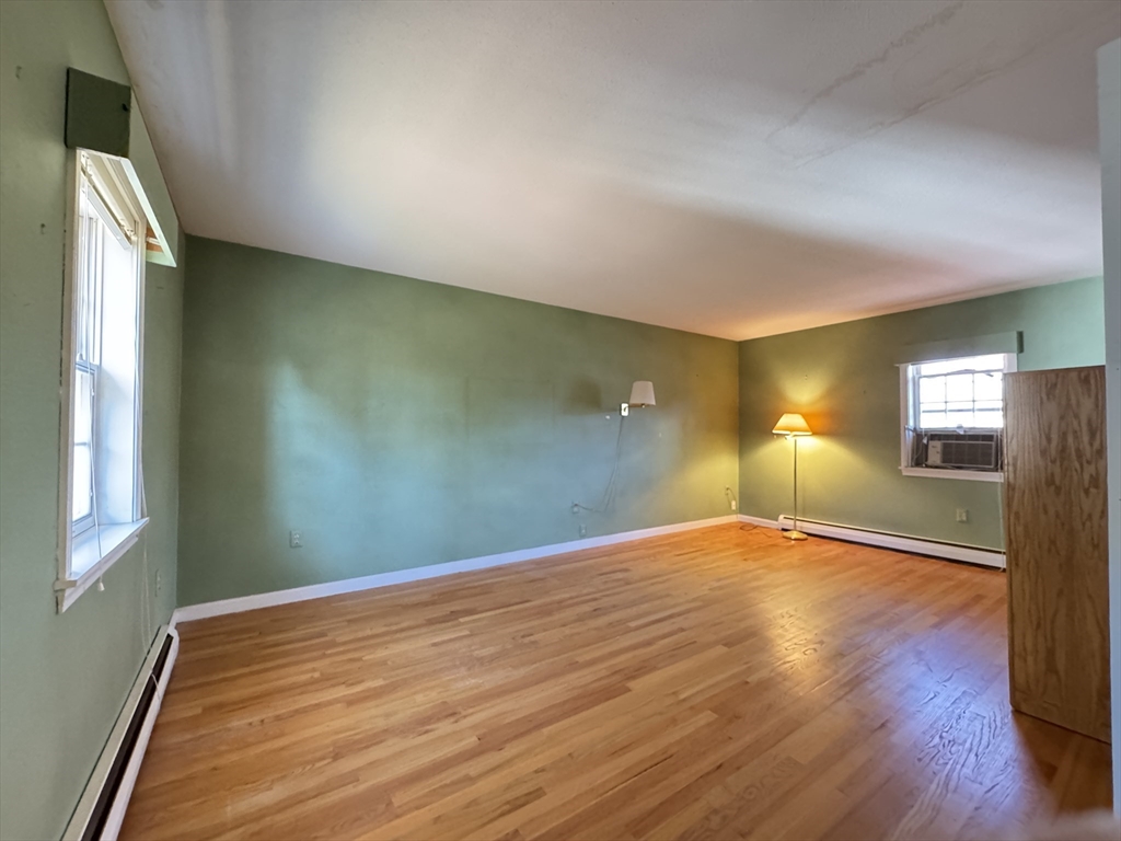 696 Bernardston Road Greenfield, MA 01301 - Photo 28 of 42 a view of empty room with wooden floor