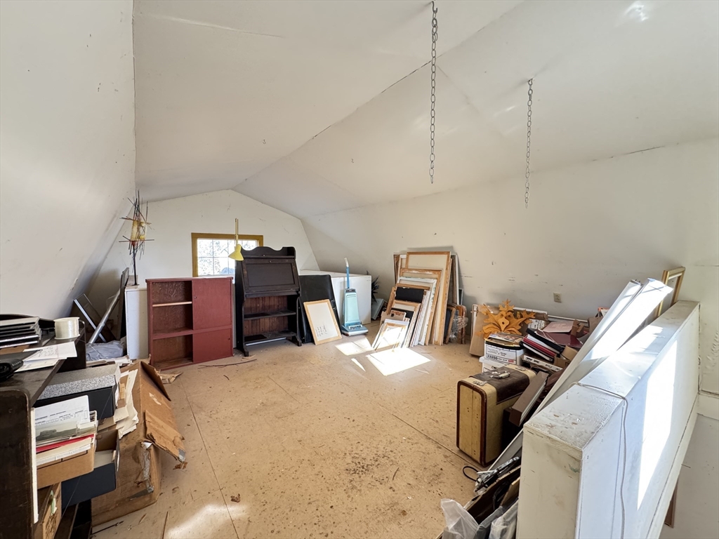 696 Bernardston Road Greenfield, MA 01301 - Photo 38 of 42 a bedroom with furniture and a gym equipment