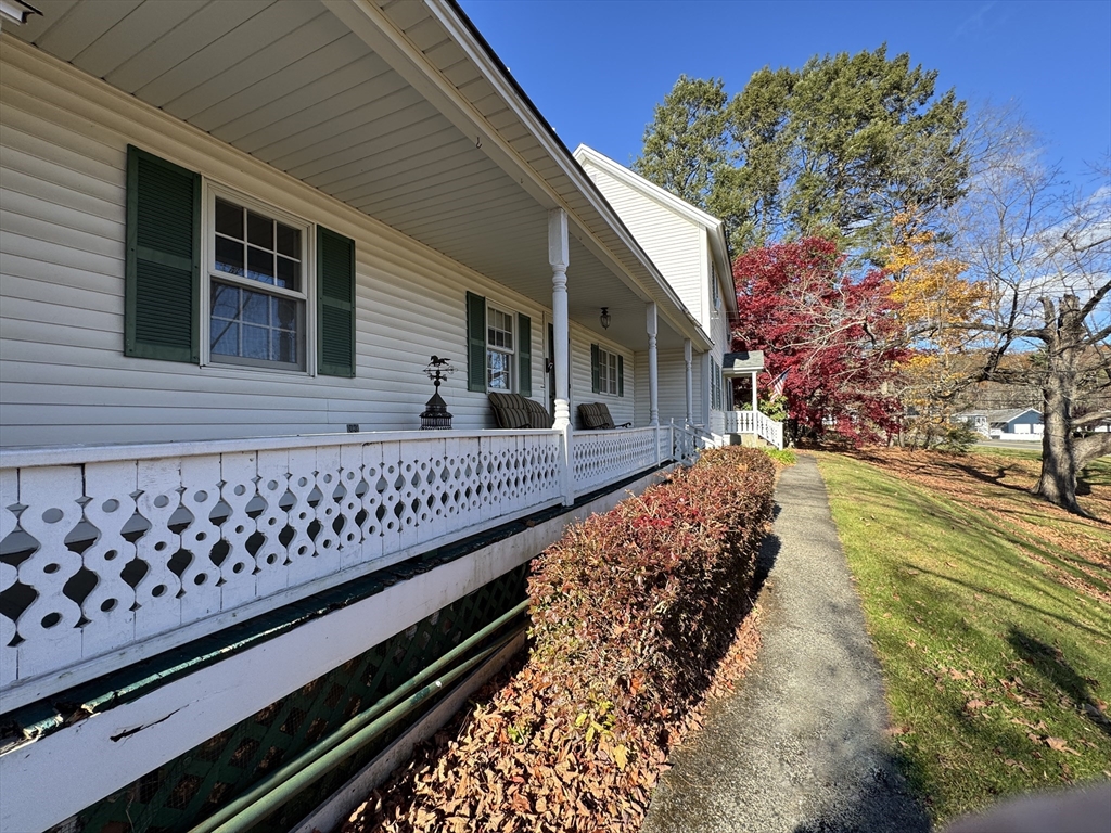 696 Bernardston Road Greenfield, MA 01301 - Photo 4 of 42 a side view of a house with a large window