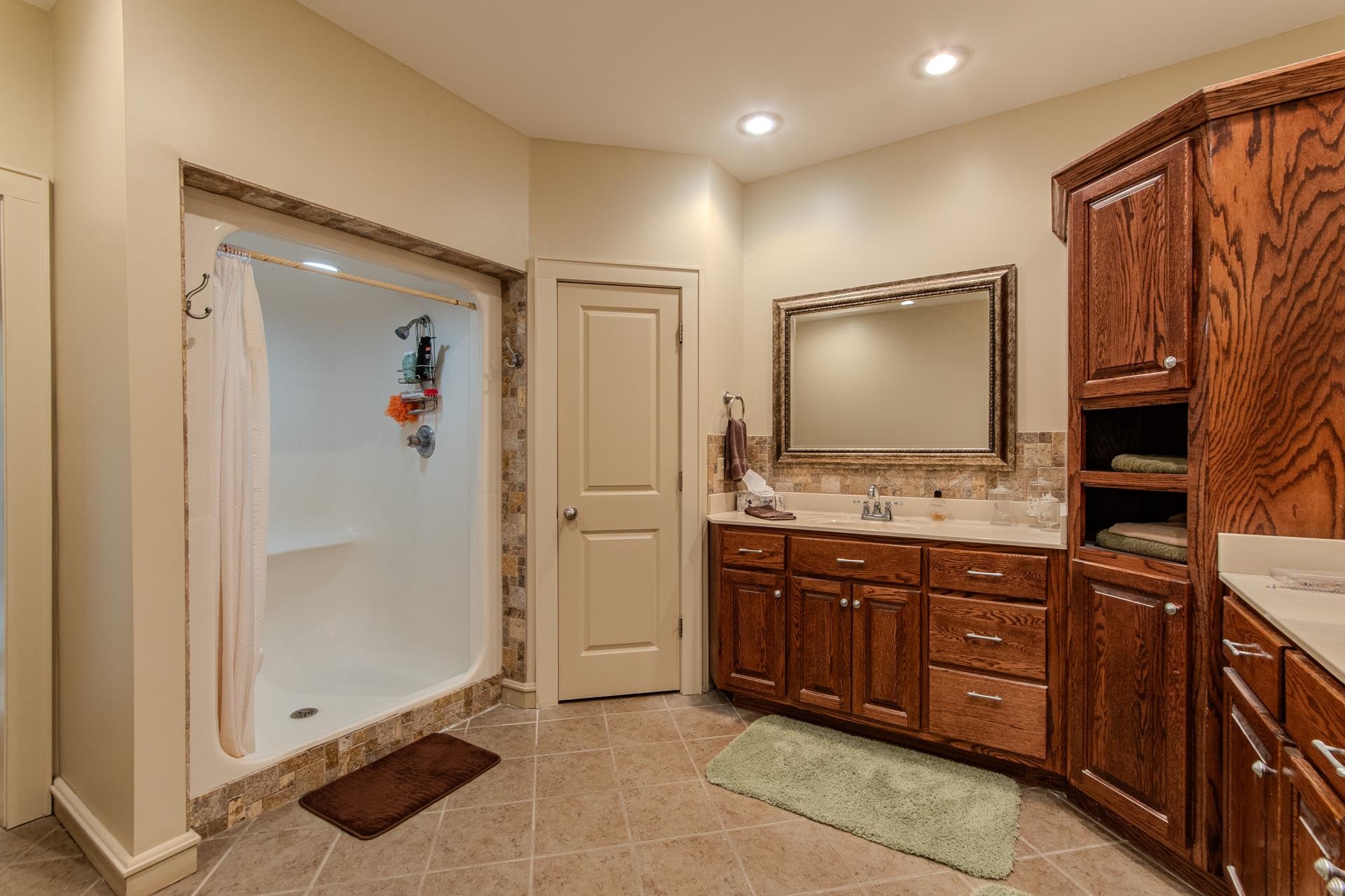 2690 Fellowship Road Sardis, TN 38371 - Photo 16 of 40 a bathroom with a sink a mirror and a shower