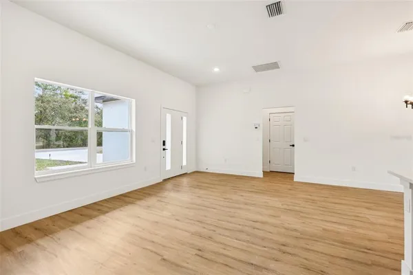 a living room with furniture and a couch