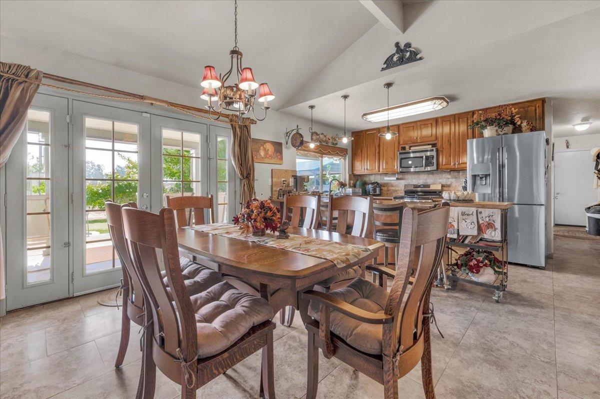 16397 Road 37 Madera, CA 93636 - Photo 17 of 74 a view of a dining room with furniture window and outside view