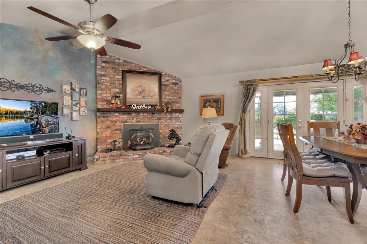 16397 Road 37 Madera, CA 93636 - Photo 47 of 74 a living room with furniture and a fireplace
