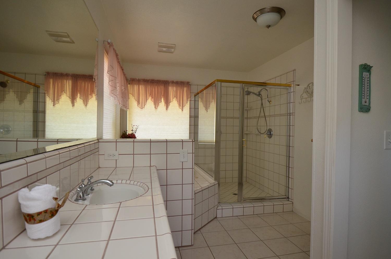 16397 Road 37 Madera, CA 93636 - Photo 50 of 74 a bathroom with a shower