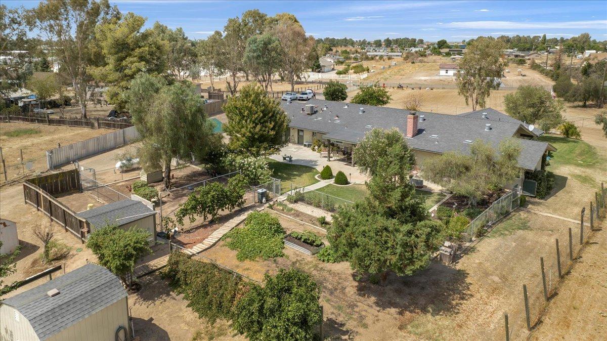 16397 Road 37 Madera, CA 93636 - Photo 10 of 74 an aerial view of residential houses with outdoor space