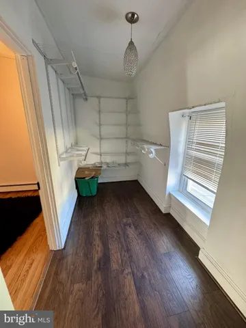 a bathroom with a sink a mirror and a toilet