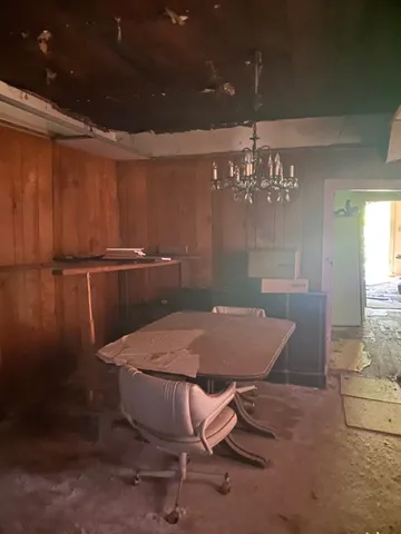 a room with furniture and chandelier