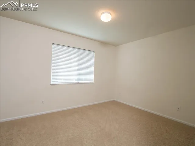 a room with furniture and a window