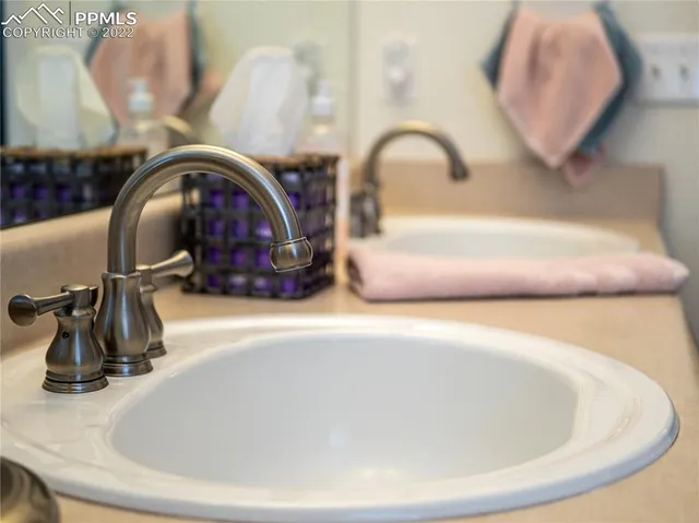 a view of a garage with parked cars