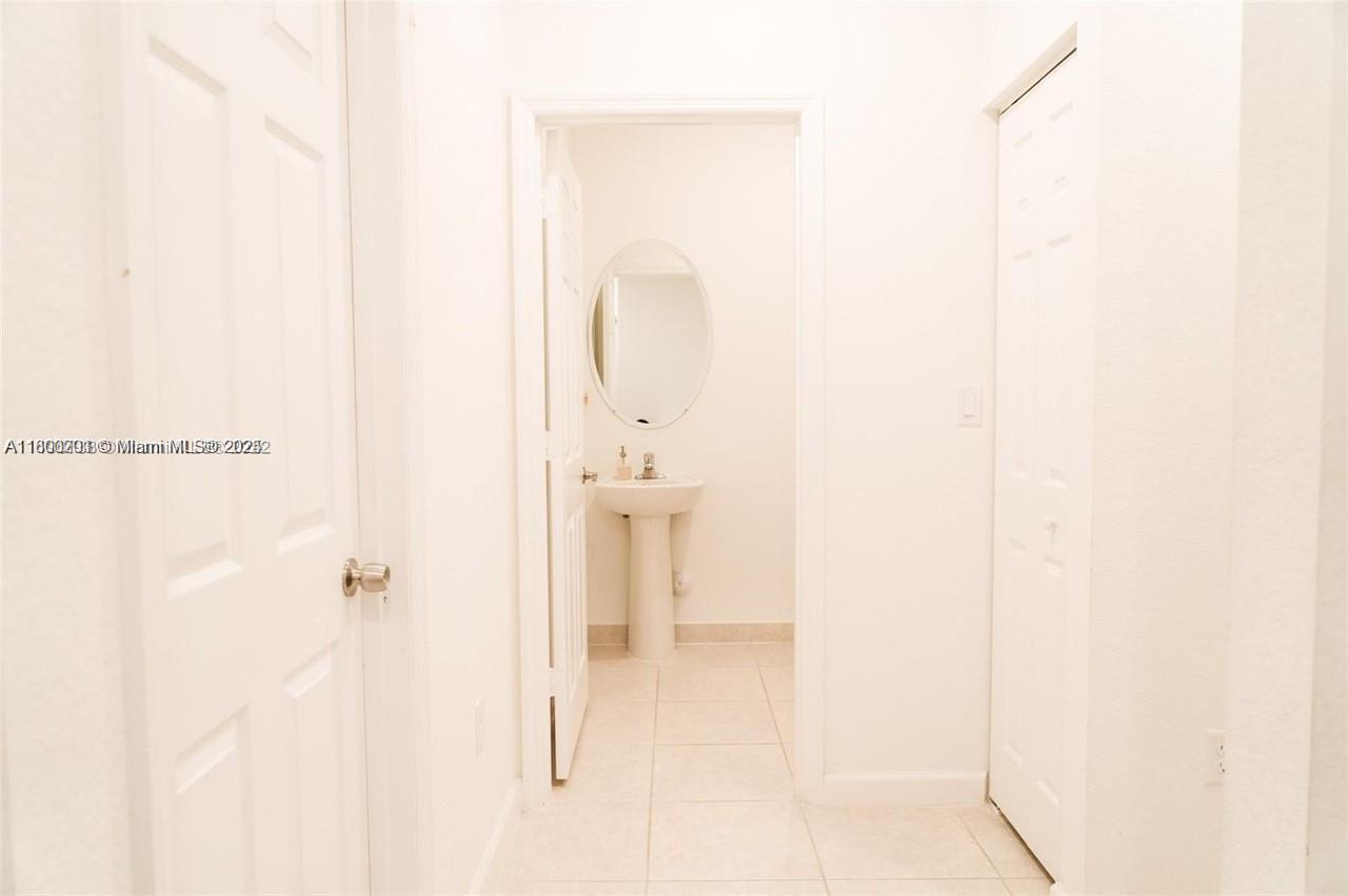 12833 Southwest 226th Street Miami, FL 33170 - Photo 7 of 13 a bathroom with a shower