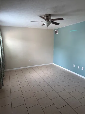 a view of a room with an empty space