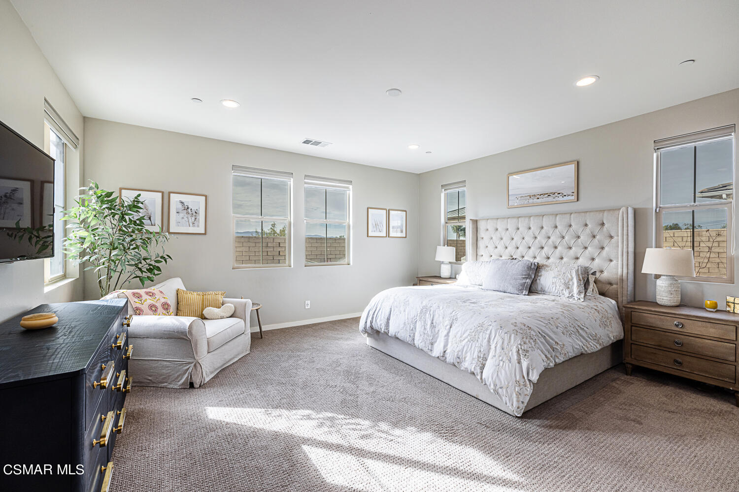 4616 Fannin Drive Simi Valley, CA 93063 - Photo 14 of 29 a spacious bedroom with a bed and a couch