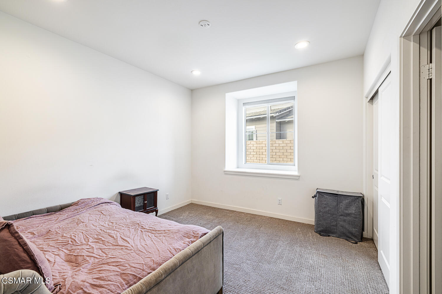 4616 Fannin Drive Simi Valley, CA 93063 - Photo 20 of 29 a bedroom with a bed and a window