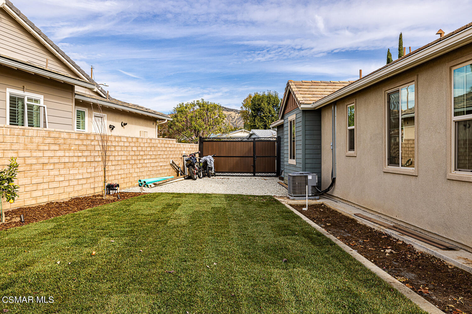 4616 Fannin Drive Simi Valley, CA 93063 - Photo 25 of 29 a view of a house with backyard and sitting area