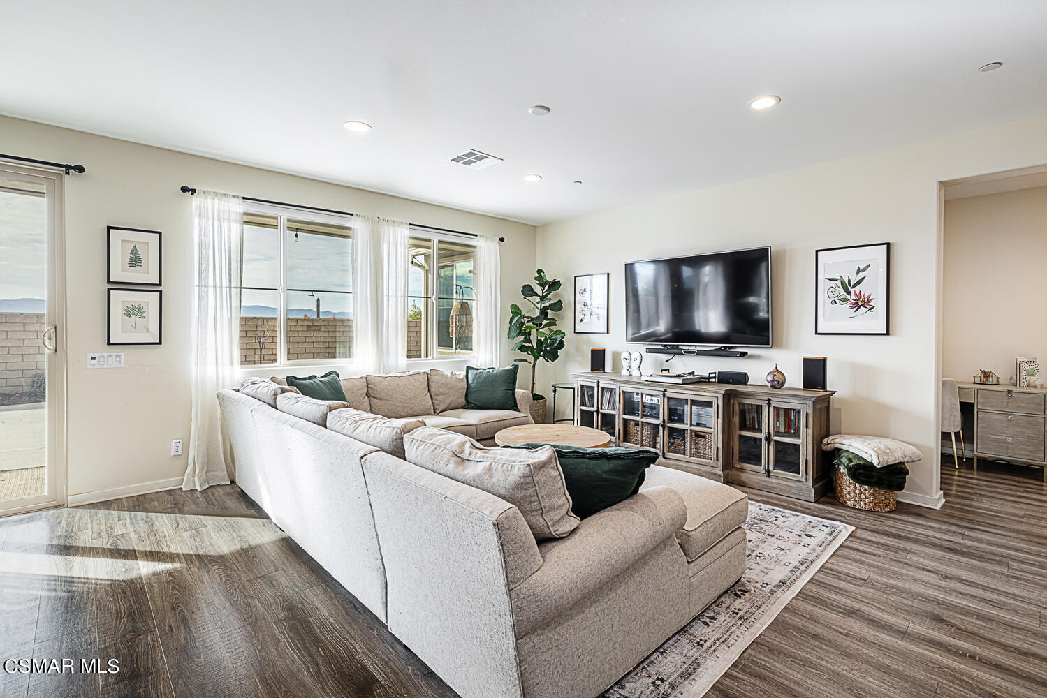 4616 Fannin Drive Simi Valley, CA 93063 - Photo 6 of 29 a living room with furniture and a flat screen tv