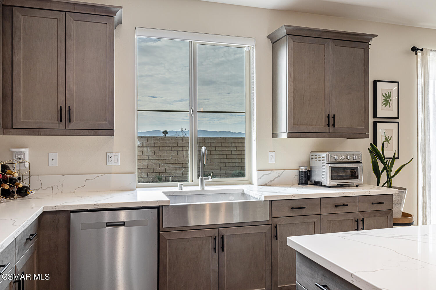 4616 Fannin Drive Simi Valley, CA 93063 - Photo 8 of 29 a kitchen with stainless steel appliances a sink stove and cabinets