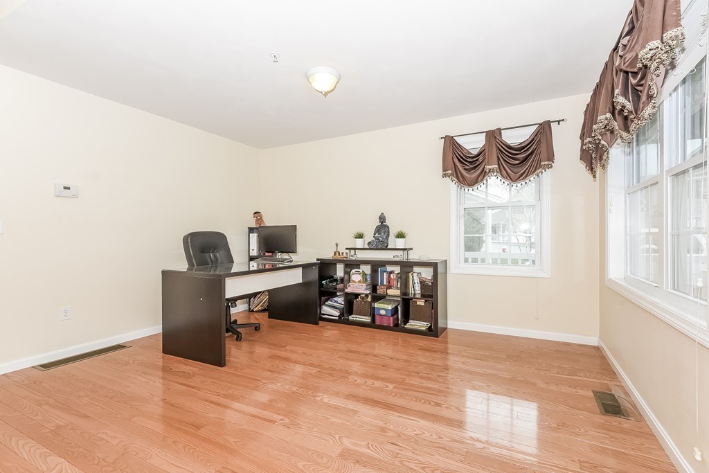 615 Nashua Road, Unit 9 Dracut, MA 01826 - Photo 12 of 30 a work room with furniture and a window