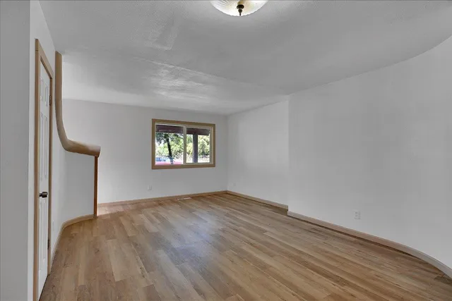 a bathroom with a tub and shower