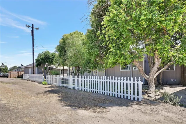 a view of a park with a street