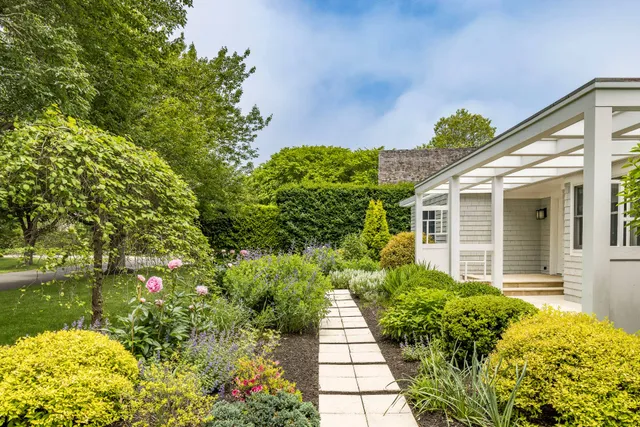a view of a house with garden