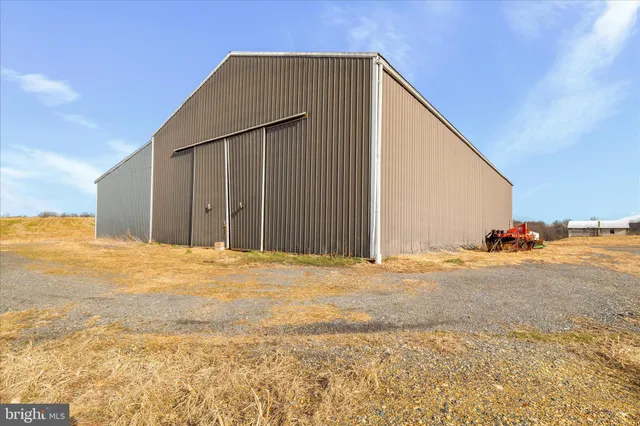 a big room with yard and ocean view