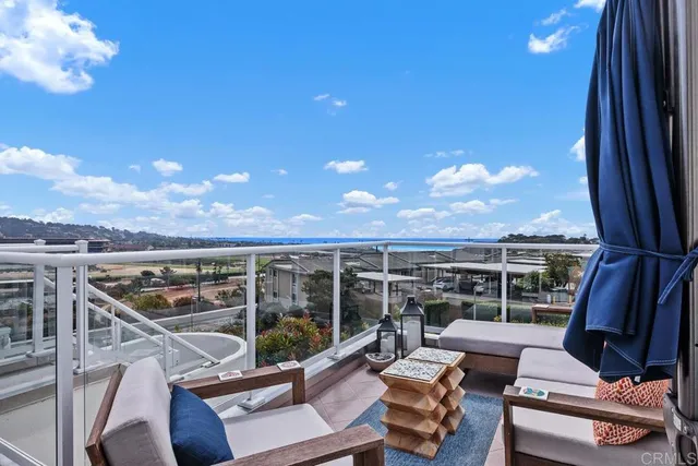 a view of roof deck with patio