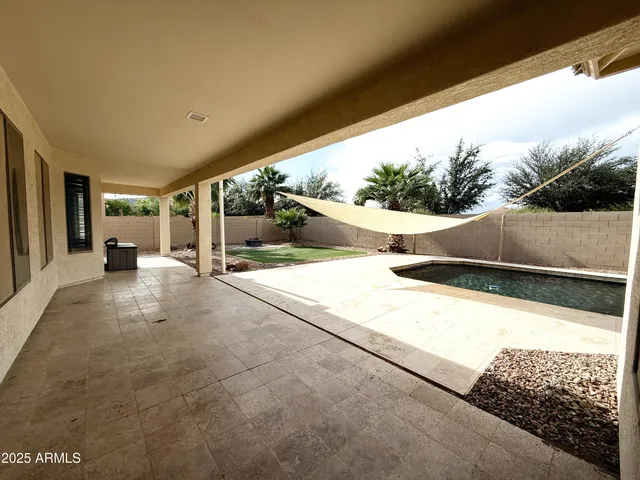 a view of balcony with furniture
