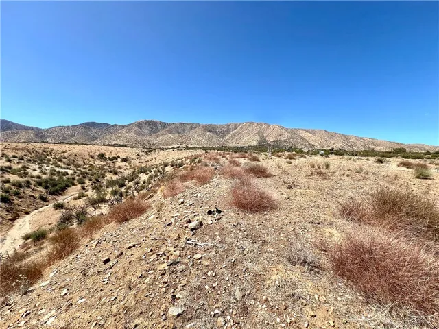 a view of lake and mountain