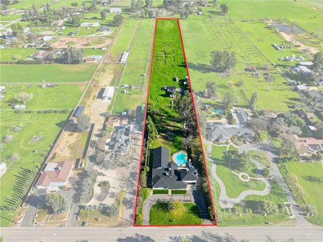 a view of a yard with an outdoor space