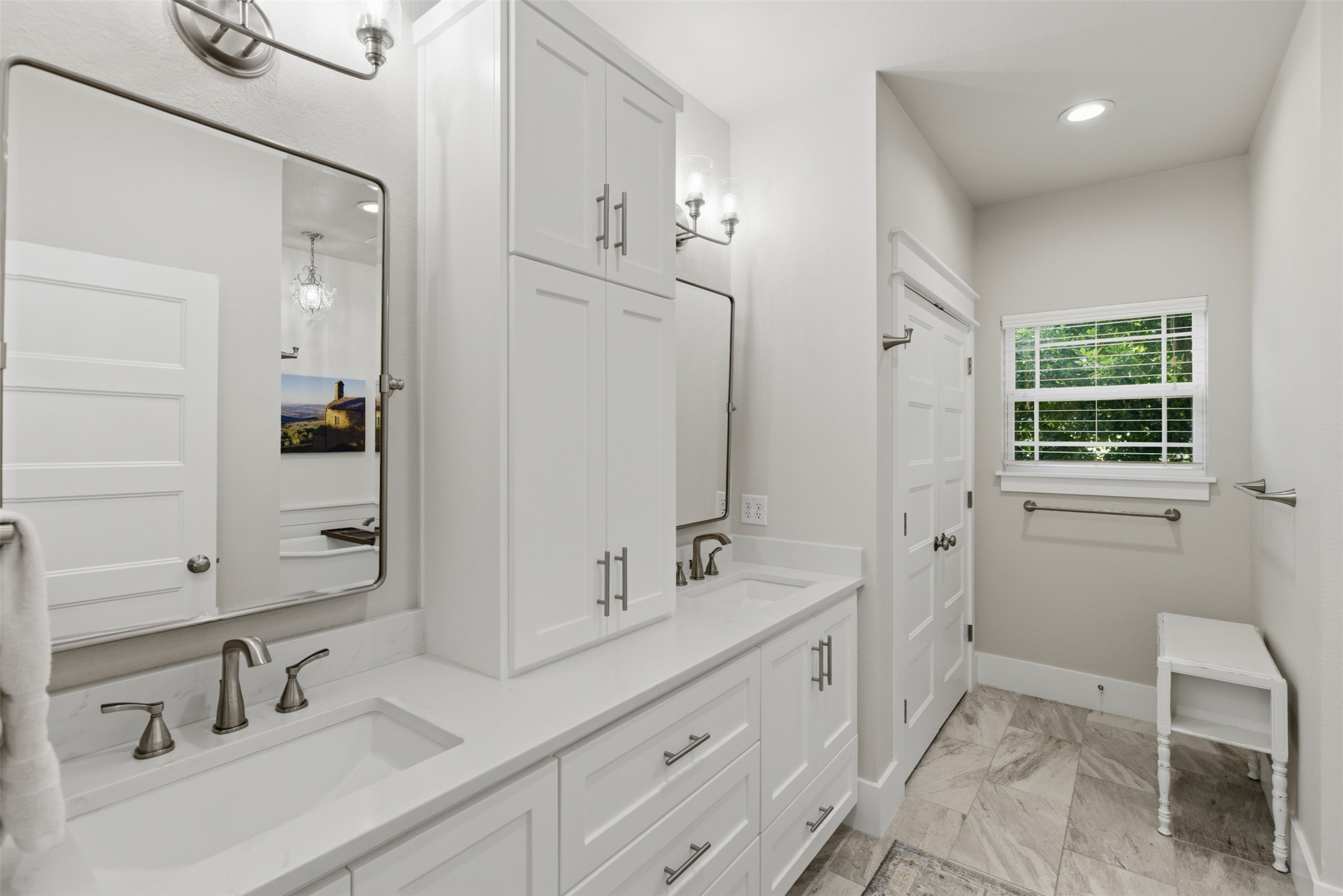 1804 Tanner Loop Taylor, TX 76574 - Photo 13 of 40 A custom dual vanity offers generous space to get ready, while an additional closet provides ample storage in the en suite bath.